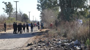 Los cuerpos estaban entre bolsas de basura en el descampado.
