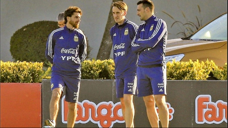Matías Manna, junto a Pablo Aimar y Lionel Scaloni.